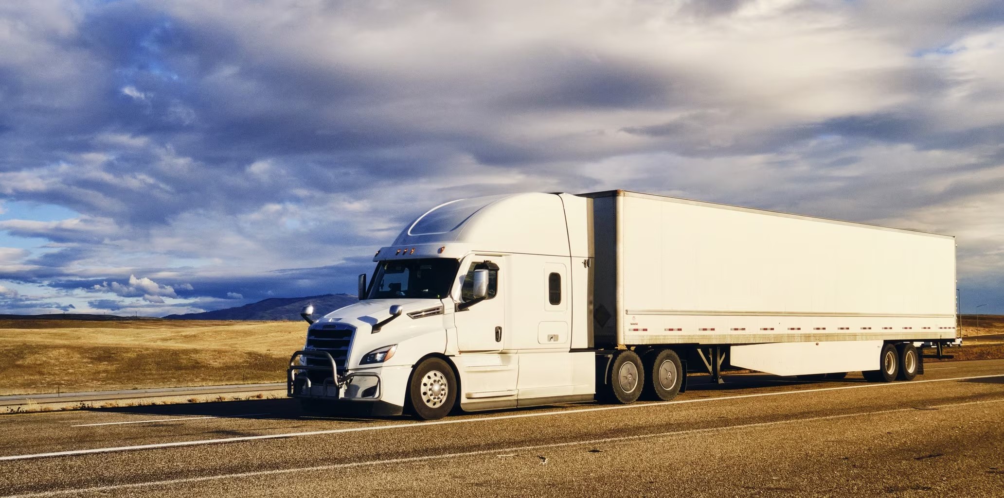 Tractor trailer moving freight